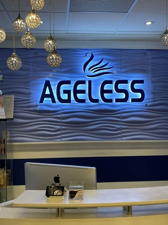 Ageless illuminated channel letters and backlit swan logo