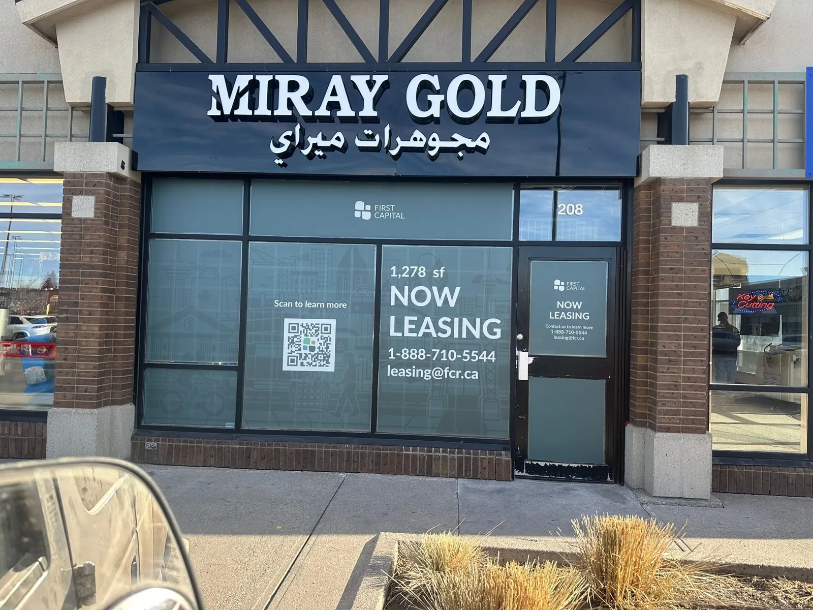Miray Gold jewellery storefront sign with Arabic lettering on a black fascia