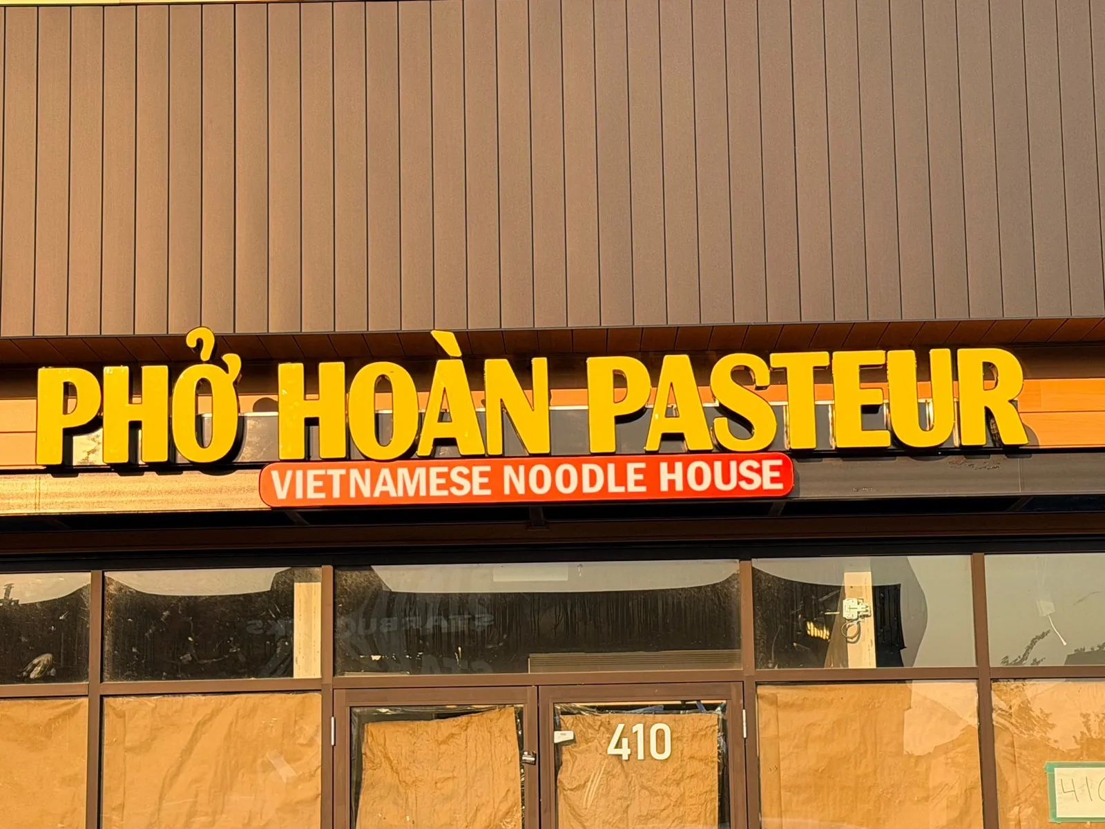 Pho Hoan Pasteur front lit yellow letters with red Vietnamese Noodle House lightbox